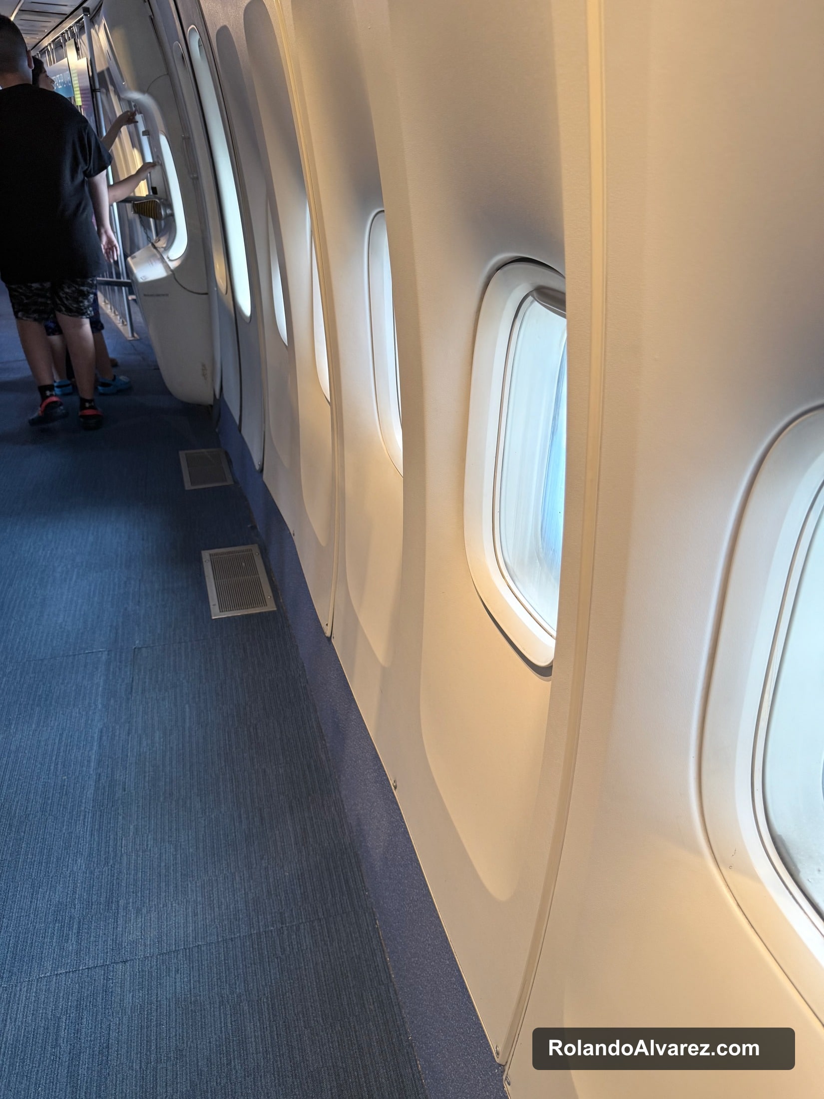 A row of windows inside the shuttle carrier aircraft exhibit
